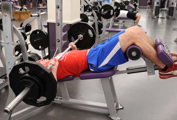 Finance senior Jared Duenckel does a bench press in the UREC on January 13, 2013.
 