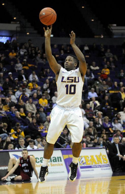 LSU junior guard Andre Stringer (10) fires Wednesday, Jan. 16, 2012 a field goal during the 73-82 overtime loss to the University of South Carolina in the PMAC.
 