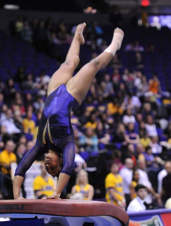 LSU junior all-around Maliah Mathis vaults Friday, Jan. 11, 2013 during the Tiger's 196.875-196.575 win over Florida in the PMAC.
 