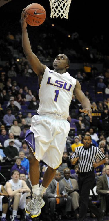 LSU sophomore guard Anthony Hickey (1) scores Wednesday, Jan. 16, 2013 after a steal during the 73-82 loss to the University of South Carolina in the PMAC.
 