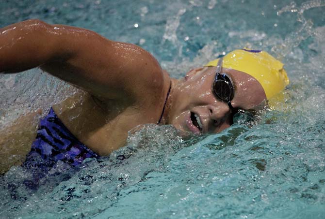 LSU senior Sara Halay takes a breath during the 500 yard freestyle at the girl's swim meet vs. Tulane, Rice, and Houston in the Natatorium on Jan. 26, 2013.
 