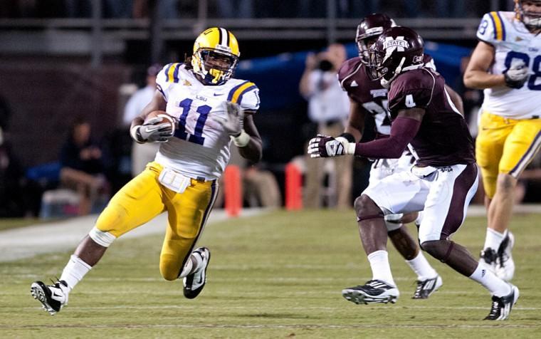 Then-sophomore running back Spencer Ware (11) runs the ball Sept. 15, 2011 during the Tigers' 19-6 win against Mississippi State in Starkville. Ware ran for 107 yards during the game.