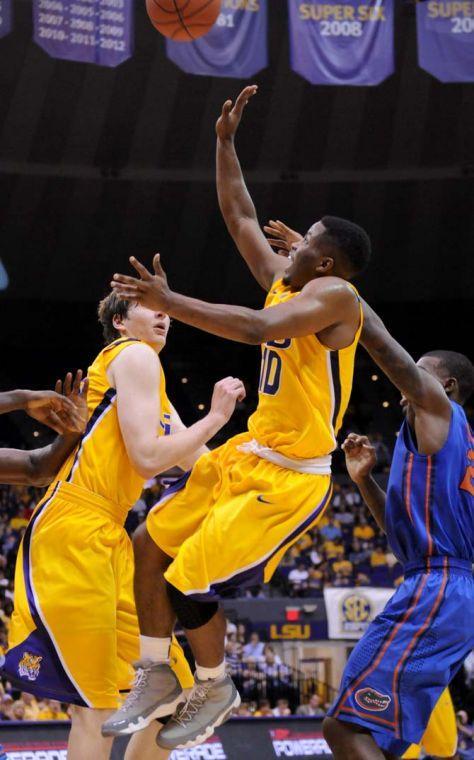 Andre Stringer (10), LSU junior guard, shoots the ball Saturday, Jan. 12 during the LSU vs. Florida game.
 