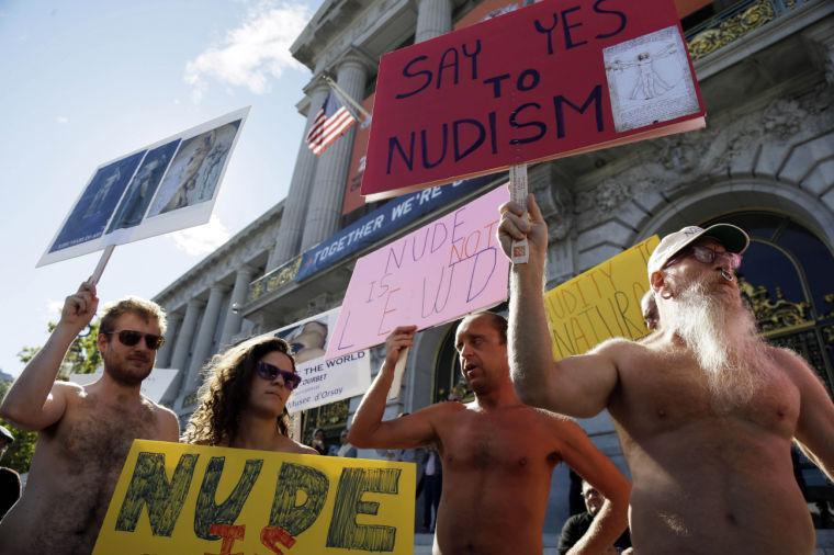 FILE - In this Nov. 14, 2012 file photo, demonstrators gather at a protest against a proposed nudity ban outside of City Hall in San Francisco. A federal judge has cleared the way for San Francisco's ban on most displays of public nudity to take effect on Feb. 1. U.S. District Court Judge Edward Chen ruled Tuesday Feb. 29, 2013 that the city ordinance prohibiting adults from displaying their genitals does not violate the free speech rights of people who like going out in the buff. (AP Photo/Marcio Jose Sanchez, File)
 