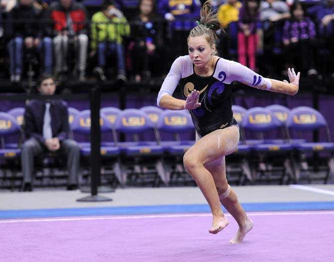 LSU junior all-around Kaleigh Dickson sprints on the floor Jan. 4, 2013 during the Tiger's 196-194 win over NC State in the PMAC.
 