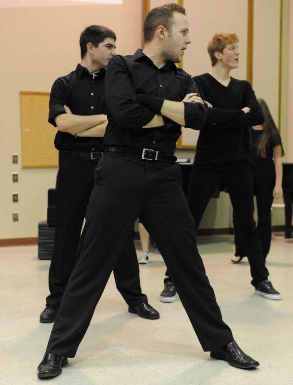 Graduate student Lance Bordelon (center) practices Jan. 13, 2013, with other cast members of "The Seven," a musical written by pre-pharmacy senior Michael Braud (not pictured).
 