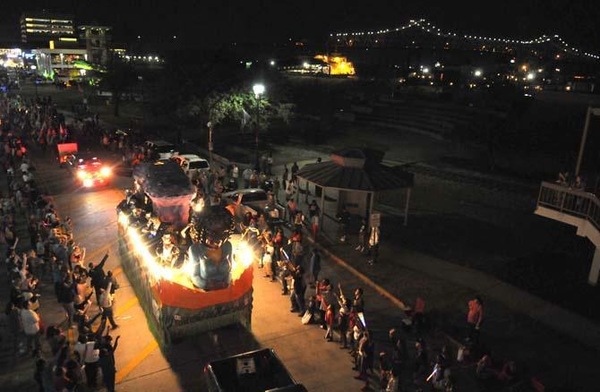 Floats pass by spectators Saturday Jan. 26, 2013 during the Krewe of Jupiter and Juno in front of the Baton Rouge River Center.
 