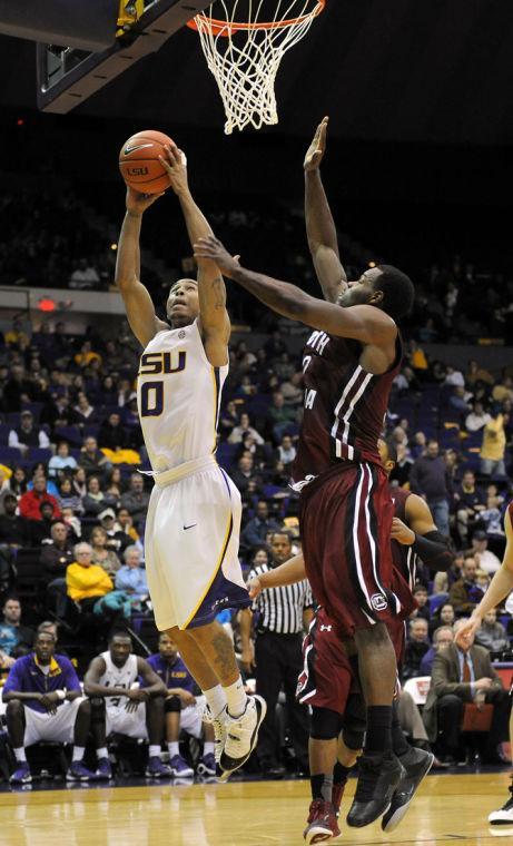 LSU senior guard Charles Carmouche (0) shoots Wednesday, Jan. 16, 2013 the basketball during the 73-82 overtime loss to the University of South Carolina in the PMAC.
 