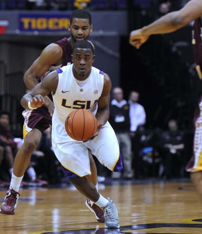 Anthony Hickey (1), LSU sophomore guard, dribbles the ball Saturday, Jan. 5, during the LSU vs. Bethune Cookman game.
 