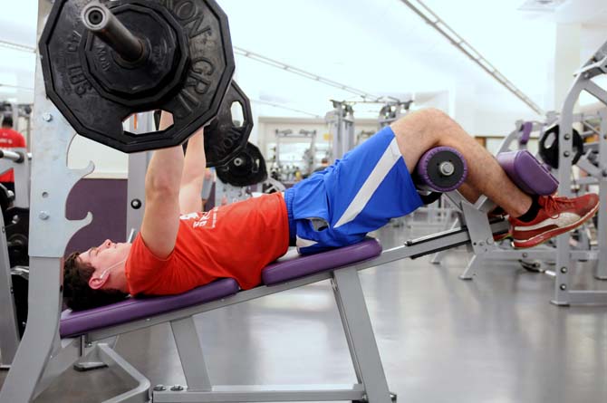 Finance senior Jared Duenckel does a bench press in the UREC on January 13, 2013.