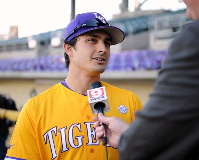 LSU sophomore outfielder Chris Sciambra talks to a reporter on LSU Baseball Media Day in Alex Box Stadium on Jan. 25, 2013.
 