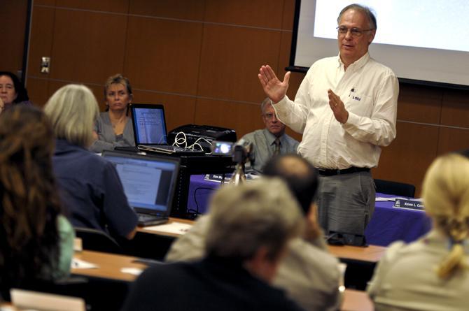 LSU finance professor Don Chance presents a slideshow in support of changing the University's grading system to a "plus or minus" system on Tuesday, Oct. 2, 2012, at the Faculty Senate meeting. Chance proposed the new grading system, which he claims would allow for more accuracy and flexibility in grading.