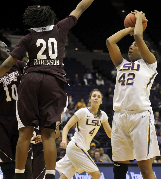 LSU sophomore forward Sheila Boykin (42) shoots Sunday, Jan. 13, 2013 over Mississippi State sophomore forward Shamia Robinson (20) during the 62-42 victory over the bulldogs in the PMAC.
 