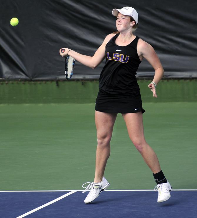 LSU freshman Caroline Hudson returns Saturday, Jan. 26, 2013 the Northwestern serve during the Tigers' doubles match against Wildcats at "Dub" Robinson Stadium.
 