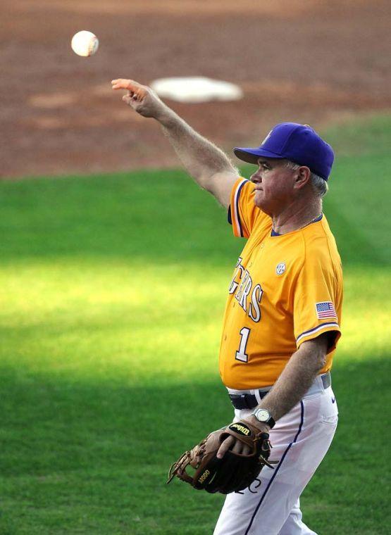 LSU baseball head coach Paul Mainieri throws on the field Jan. 25, 2013 during the Tiger's first preseason practice in Alex Box Stadium.
 