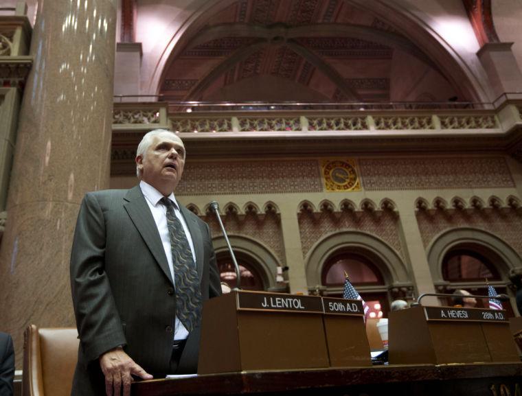 Assemblyman Joseph Lentol, D-Brooklyn, explains his vote for New York's Secure Ammunition and Firearms Enforcement Act in the Assembly Chamber at the Capitol on Tuesday, Jan. 15, 2013, in Albany, N.Y. New York's Assembly passed the toughest gun control law in the nation and the first since the Newtown, Conn., school shooting, calling for a tougher assault weapons ban and provisions to try to keep guns out of the hands of the mentally ill who make threats. Lentol is a co-sponsor of the bill in the Assembly which passed 104-43. (AP Photo/Mike Groll)
 