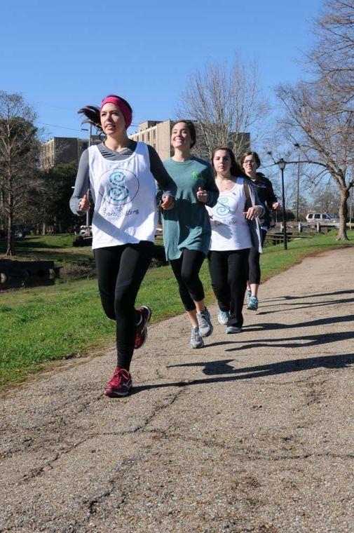 Sole Sisters running participants jog around the LSU lakes Thursday January 17, 2013 near the UREC. (From front to back) Mass communication junior Carley Wahlborg, kinesiology sophomore Caitlyn Babco, elementary education junior Emily Labbe, and accounting junior Molly Longo.
 