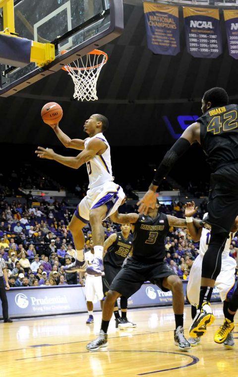 LSU senior guard Charles Carmouche (0) goes for two during the Tigers' 73-70 victory against Mizzou Wednesday Jan. 30, 2013 in the PMAC.
 