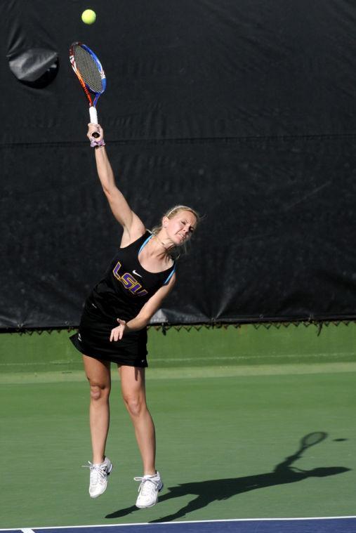 LSU junior Ariel Morton serves Saturday, Jan. 26, 2013 during the doubles match against Northwestern at "Dub" Robinson Stadium.
 