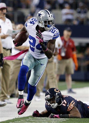 Dallas Cowboys cornerback Morris Claiborne (24) escapes from Chicago Bears wide receiver Alshon Jeffery (17) during the second half of an NFL football game Monday, Oct. 1, 2012, in Arlington, Texas. The Bears won 34-18. (AP Photo/The Waco Tribune-Herald, Jose Yau)
 