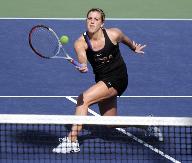 LSU sophomore Mary Jeremiah returns a volley Saturday, Jan. 26, 2013 during the doubles match against Northwestern at "Dub" Robinson Stadium.
 