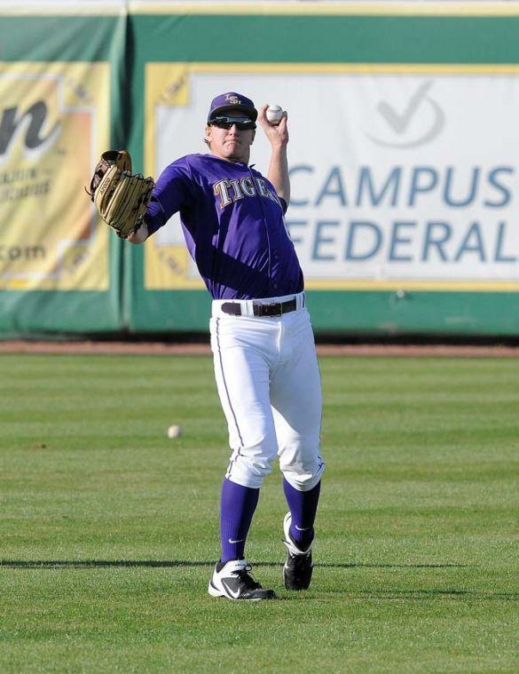 LSU freshman outfielder Andrew Stevenson (6) tosses a ball Jan. 25, 2013 during the Tiger's first preseason practice in Alex Box Stadium.
 