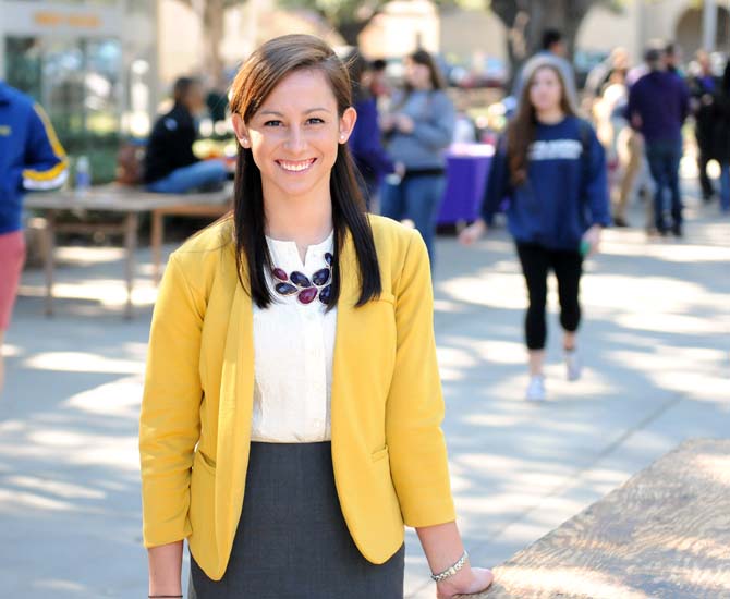 Student Government's Chief Justice Morgan Faulk stands in front of Free Speech Alley Tuesday, Jan. 22, 2013. She is the first new Chief Justice elected in the past three and a half years.
 