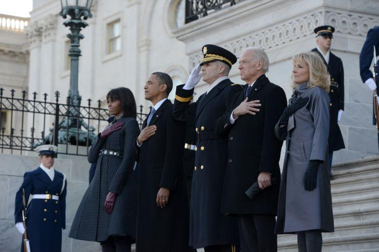 President Barack Obama, first lady Michelle Obama, Vice President and Mrs. Biden and Maj. Gen. Michael S. Linnington, participate in the review of the troops on Capitol Hill in Washington, Monday, Jan. 21, 2013, following the president's ceremonial swearing-in ceremony during the 57th Presidential Inauguration. (AP Photo/Washington Post, Linda Davidson, Pool)
 