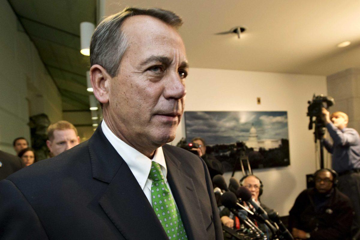 FILE - In this Jan. 1, 2013, file photo, Speaker of the House John Boehner, R-Ohio, walks past reporters after a closed-door meeting meeting of House Republicans as the "fiscal cliff" bill passed by the Senate the previous night waits for a vote in the GOP-controlled House at the Capitol in Washington. After Republicans and Democrats alike reluctantly shunned their core supporters and reached a bipartisan compromise to avert a fiscal crisis, there's a reasonable question to ask: Did American lawmakers actually _ for a moment, at least _ listen to the regular Joes and Janes pleading for a gridlocked Washington to get something, anything, done? (AP Photo/J. Scott Applewhite, File)