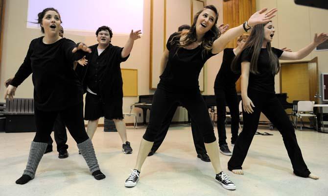 Cast members of "The Seven," a musical created by senior pre-pharmacy major Michael Braud (not pictured), practice Sunday, Jan. 13, in the School of Music building. The show opens Jan. 24 on the Second Stage of Baton Rouge Little Theater.
 