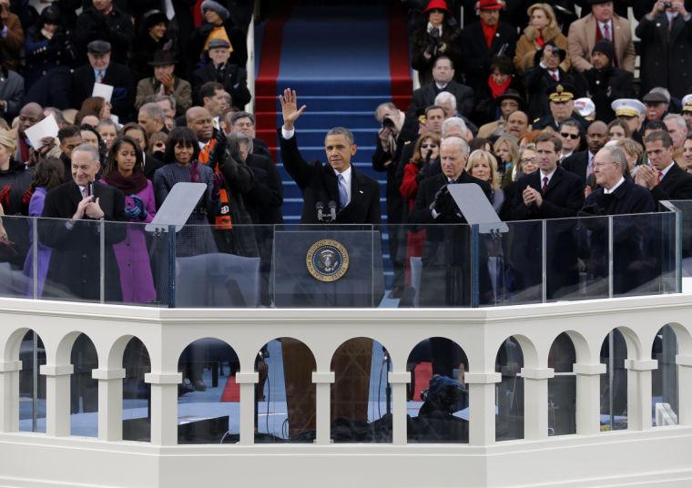 President Barack Obama waves to crowd after his Inaugural speech at the ceremonial swearing-in on the West Front of the U.S. Capitol during the 57th Presidential Inauguration in Washington, Monday, Jan. 21, 2013. (AP Photo/Scott Andrews, Pool)
 