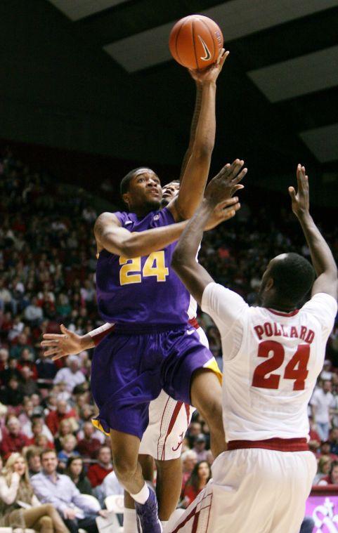 LSU guard Malik Morgan (24) takes a shot over Alabama forward Devonta Pollard (24) during the first half of an NCAA college basketball game in Tuscaloosa, Ala., Saturday, Feb. 9, 2013. (AP Photo/Tuscaloosa News, Michelle Lepianka Carter)
 