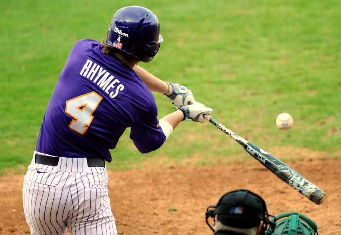 LSU senior outfielder Raph Rhymes (4) attempts to hit the ball Sunday Feb. 24, 2013 during the Tigers' 13-1 victory against Southeastern in Alex Box Stadium.
 