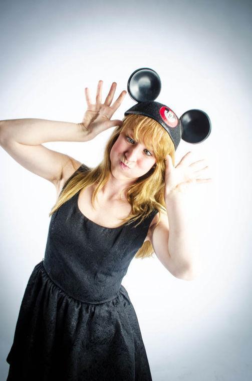 Mo Armstrong, a former Disney College Program intern, dressed as one of Disney's most beloved characters, Minnie Mouse.
 