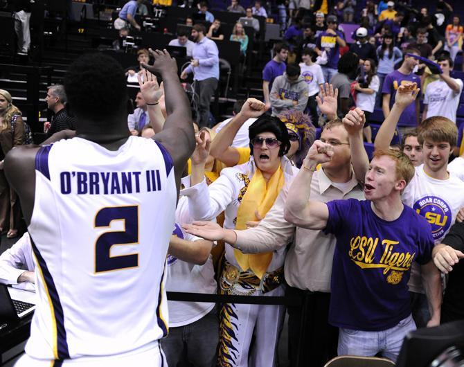 LSU sophomore forward Johnny O'Bryant (2) celebrate Wednesdsay, Feb. 6, 2013 with the Roar Corps after the LSU 57-56 victory over Vanderbilt in the PMAC.
 