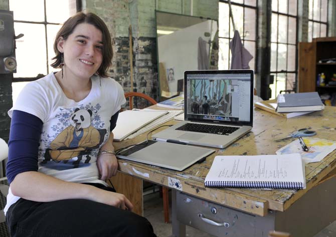 Taylor Wells, painting and drawing senior, sits Saturday, Feb 16, 2013 in her studio space in the Old Engineering Shop.
 