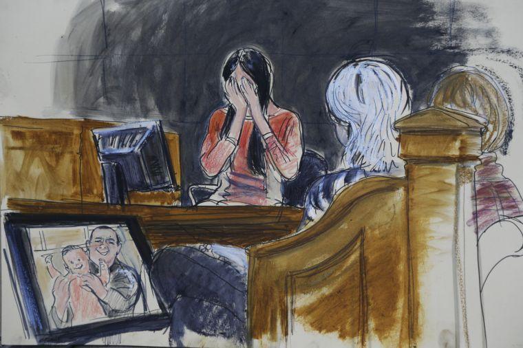 In this courthouse sketch, Kathleen Mangan reacts while she testifies in federal court Monday, Feb. 25, 2013, in New York. Struggling to stay composed, the estranged wife of a New York City police officer testified Monday that she was shocked to find he had visited a website featuring a photo of a dead woman and other gruesome images &#8212; a discovery that led to a federal prosecution accusing him of plotting to abduct, torture and eat dozens of women. (AP Photo/Elizabeth Williams)
 