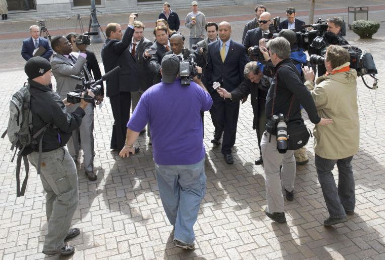 Former New Orleans Mayor C. Ray Nagin arrives at the Hale Boggs Federal Building and United States District Courthouse to appear in federal court for an arraignment on public corruption charges in New Orleans, Wednesday, Feb. 20, 2013. (AP Photo/Matthew Hinton)
 