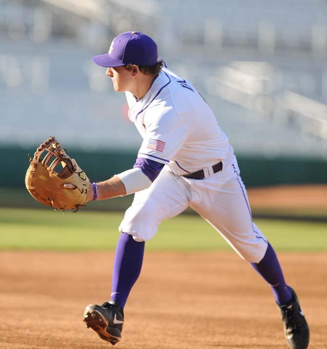 LSU senior Mason Katz runs to catch the ball during practice on Friday, Feb. 1, 2013 at Alex Box Stadium.
 