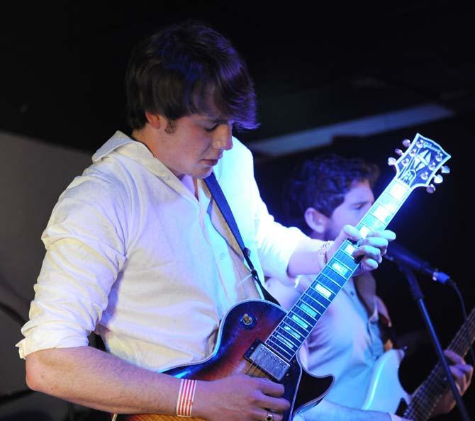 Electrical engineering freshman and Stone Rabbits lead guitarist Logan Sellers plays during a show Saturday, Feb. 2, 2013 at Shady's.
 