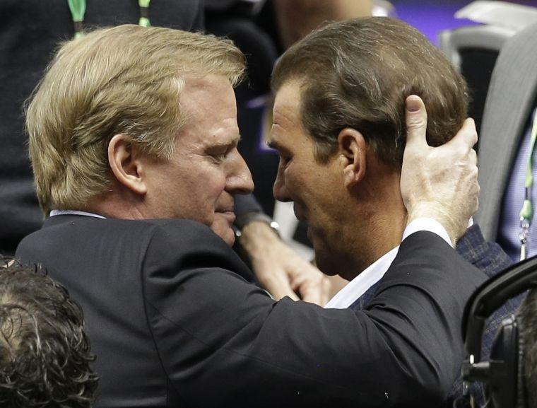 NFL Commissioner Roger Goodell, left, congratulates Baltimore Ravens owner Stephen J. Bisciotti after the Ravens' 34-31 win against the San Francisco 49ers in the NFL Super Bowl XLVII football game, Sunday, Feb. 3, 2013, in New Orleans. (AP Photo/Mark Humphrey)
 