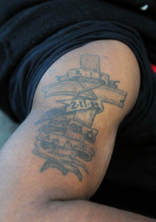 Sports administration senior Karl Acker sits in front of the union Tuesday, Feb. 26, 2013. His tattoo is a tribute to his older brother, who was stillborn, and was designed by his younger brother.
 