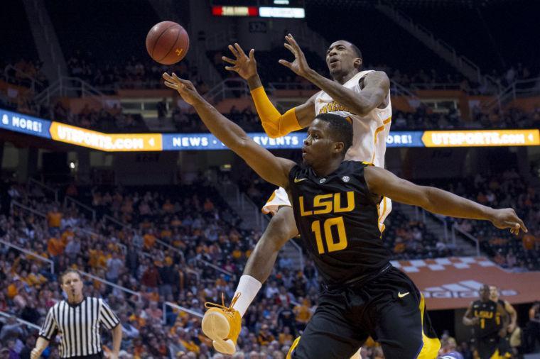 LSU's Andre Stringer (10 knocks the ball away from Tennessee's Jordan McRae during the first half of an NCAA college basketball game Tuesday, Feb. 19, 2013, in Knoxville, Tenn. (AP Photo/The Knoxville News Sentinel, Saul Young)
 