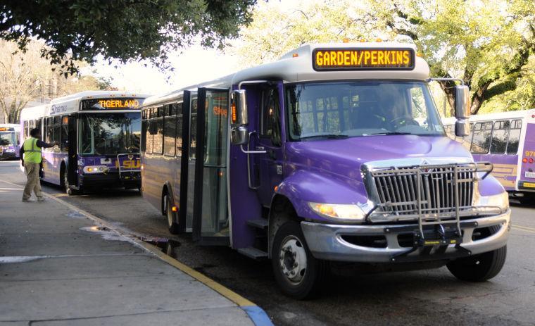 Busses pick up students on Feb. 7, 2013 outside of the Journalism building.