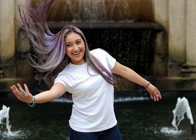 Undecided freshman Ariana Dirige flips her hair in the quad Monday, Feb. 25, 2013.
 