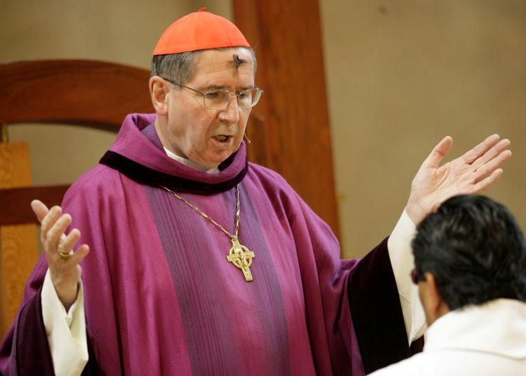 FILE - In this Feb. 6, 2008 file photo , Cardinal Roger Mahony officiates during Ash Wednesday services at the Cathedral of Our Lady of the Angels in Los Angeles. Popular pressure is mounting in the U.S. and Italy to keep California Cardinal Roger Mahony away from the conclave to elect the next pope because of his role shielding sexually abusive priests, a movement targeting one of the most prominent of a handful of compromised cardinals scheduled to vote next month. . (AP Photo/Nick Ut, File)
 