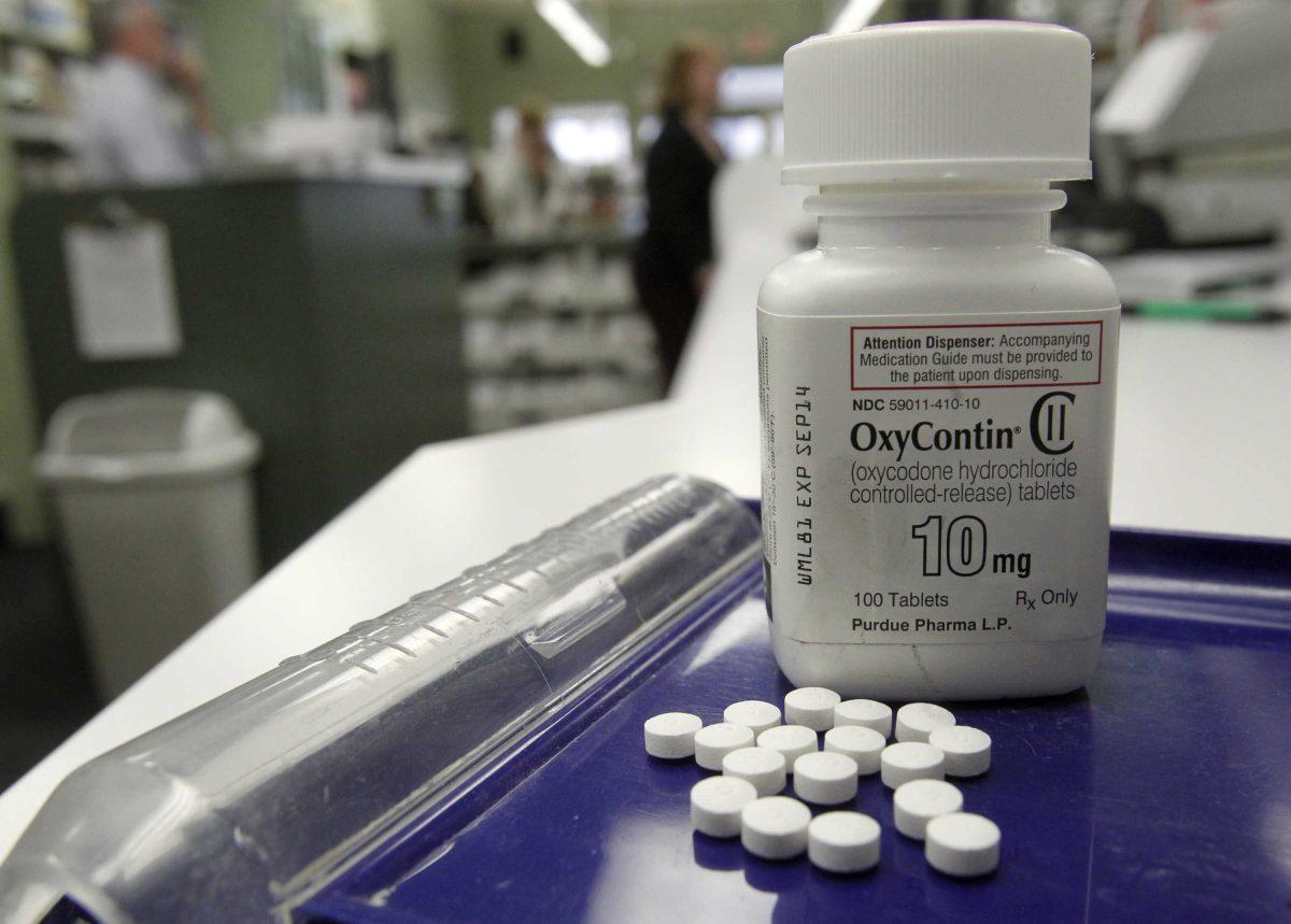 OxyContin pills are arranged for a photo at a pharmacy in Montpelier, Vt. on Tuesday, Feb. 19, 2013. Drug overdose deaths rose for the 11th straight year, federal data show, and most of them were accidents involving addictive painkillers despite growing attention to risks from these medicines. As in previous recent years, opioid drugs &#8212; which include OxyContin and Vicodin &#8212; were the biggest problem, contributing to 3 out of 4 medication overdose deaths. (AP Photo/Toby Talbot)