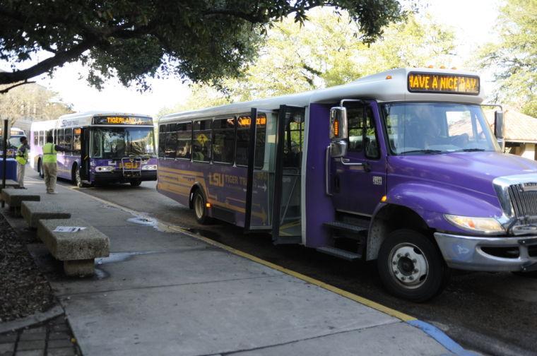 Tiger Trails buses pick up students in front of Hodges Hall. Student Government funded a new bus route to travel along Ben Hur Road on Thursday through Sunday nights. The bus will begin running tonight.
 