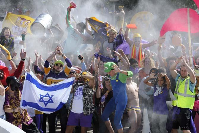 A large group of LSU students go crazy once the beat drops on Feb. 15, 2013 during the LSU Harlem Shake in front of the PMAC.
 