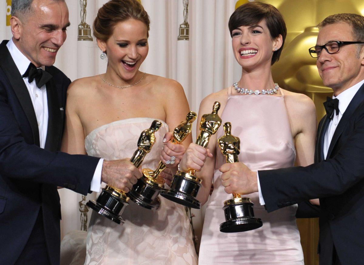 From left, Daniel Day-Lewis, with his award for best actor in a leading role for "Lincoln," Jennifer Lawrence, with her award for best actress in a leading role for "Silver Linings Playbook," Anne Hathaway, with her award for best actress in a supporting role for "Les Miserables," and Christoph Waltz,&#160;with his award for best actor in a supporting role for "Django Unchained," pose during the Oscars at the Dolby Theatre on Sunday Feb. 24, 2013, in Los Angeles. (Photo by John Shearer/Invision/AP)